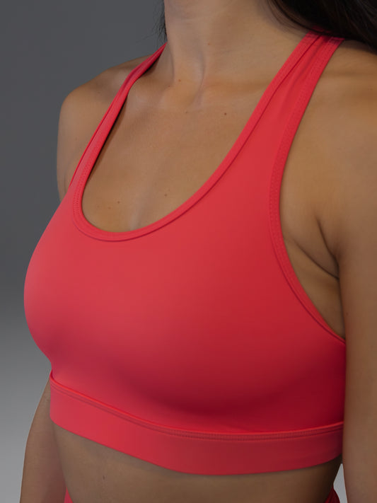 Top deportivo rojo salmón