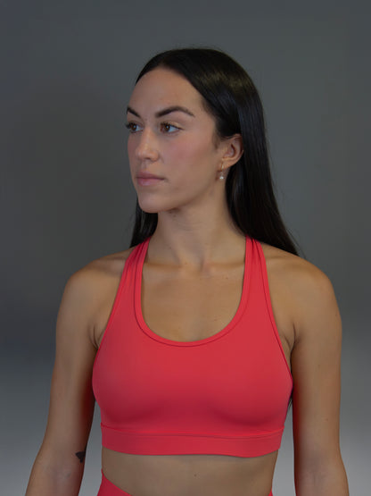 Top deportivo rojo salmón